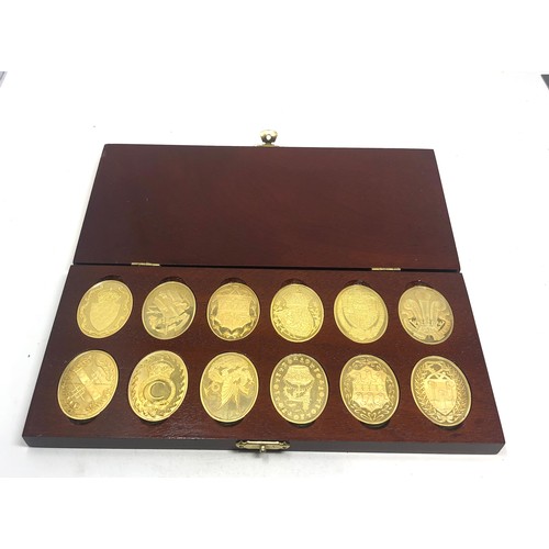 33 - Boxed the arms of the prince of wales 925 silver ingots plated in 22ct gold ingot weight 168g