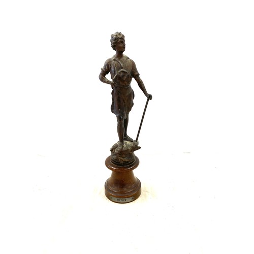 52 - Spelter figure on wooden stand, Metier 12.5