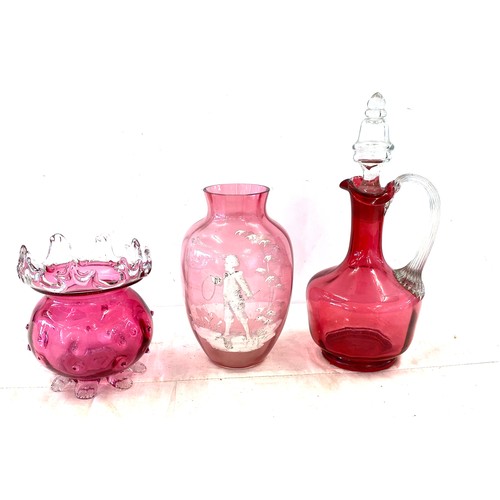 34 - Selection of vintage cranberry glass pieces to include decanter, vase and bowl