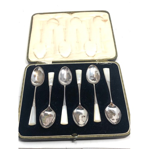 23 - Boxed set of 6 sterling silver with m.o.p handles tea spoons