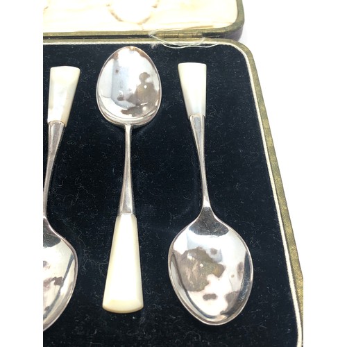 23 - Boxed set of 6 sterling silver with m.o.p handles tea spoons