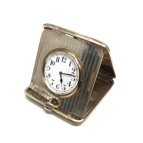17 - Antique silver cased travel clock Birmingham silver hallmarks the clock is ticking but no warranty g... 