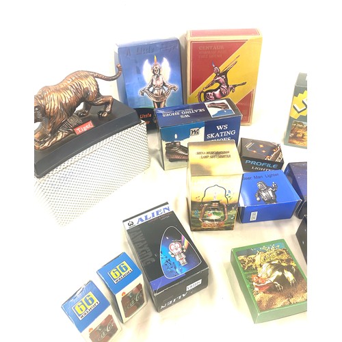 29 - Large selection of boxed novelty table lighters