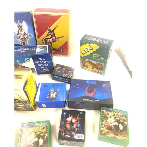 29 - Large selection of boxed novelty table lighters
