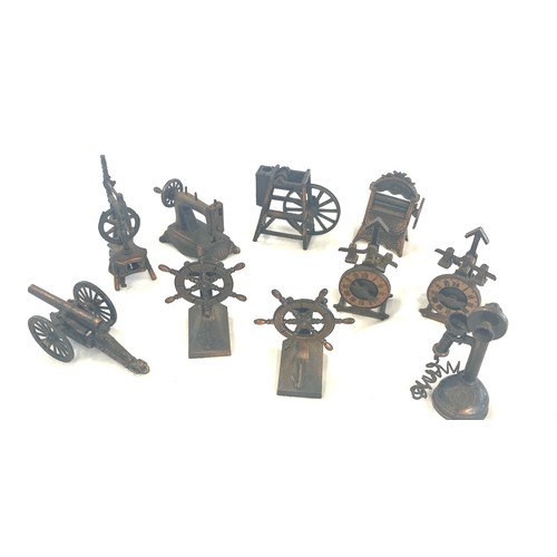 56 - Selection of novelty sharpeners includes sewing machine, clock etc