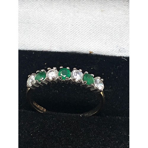 56 - 9ct gold emerald and cz ring (1.2g