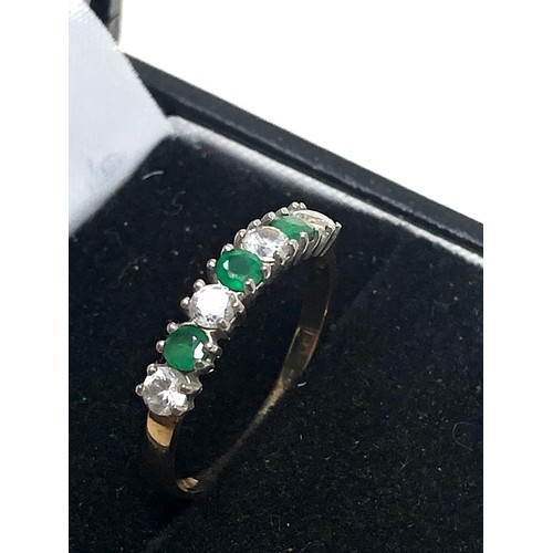 56 - 9ct gold emerald and cz ring (1.2g
