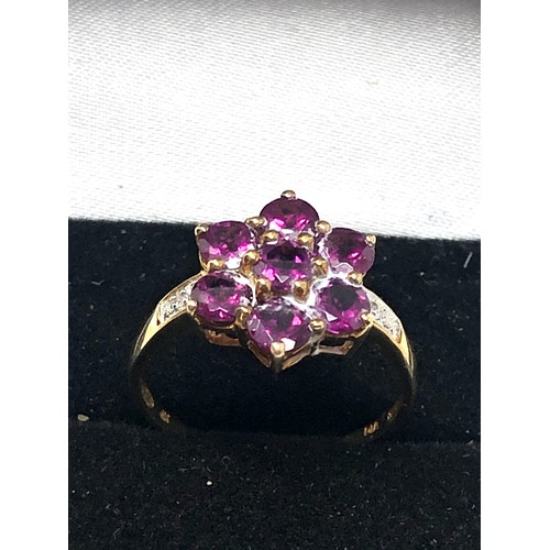 49 - 9ct gold garnet & diamond floral ring (2.1g)