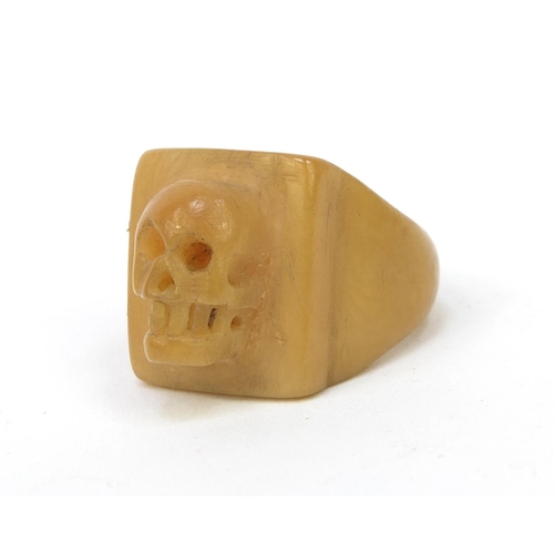 36 - Carved vegetable ivory skull ring, 2cm high