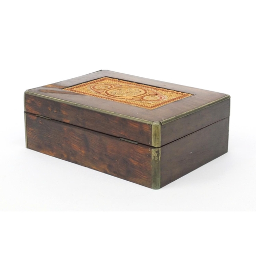 27 - Victorian olive wood box decorated with a scrolled paperwork top and silver plated edging, 19cm wide
