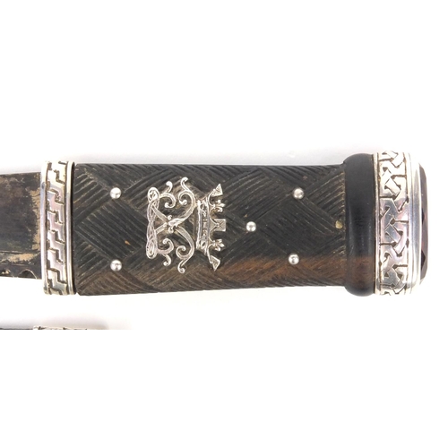 59 - Scottish dirk with weave design handle and silver mounts, the pommel inset with a citrine, T.E. Edin... 