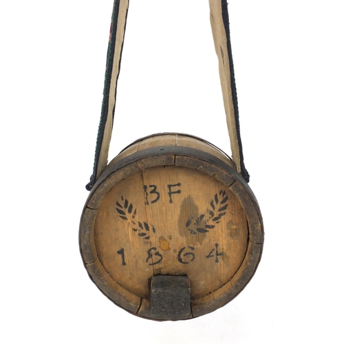 18 - Wooden Swiss St Bernard dog barrel shaped brandy carrier on a tapestry collar dated 1864, 18cm diame... 