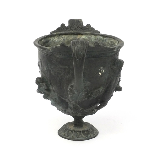 2 - Antique bronze urn embossed with classical scenes, the interior with applied phallic symbol, 14cm hi... 