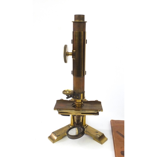 33 - 19th Century J.B. Dancer of Manchester double pillar brass microscope, together with fitted mahogany... 
