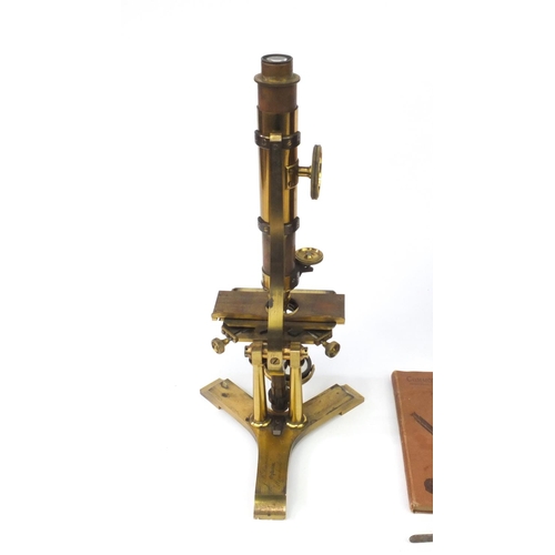 33 - 19th Century J.B. Dancer of Manchester double pillar brass microscope, together with fitted mahogany... 