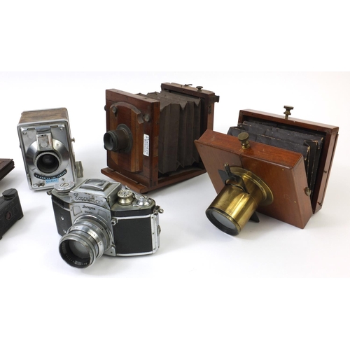 203 - Group of cameras including a Lancaster & Son of Birmingham mahogany plate camera, two Exacta cameras... 
