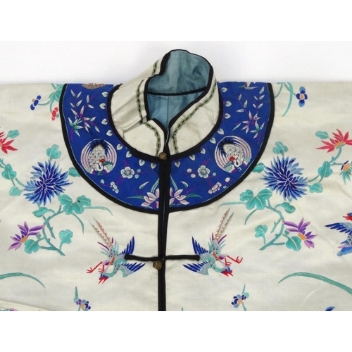 579 - Chinese silk kimono embroidered with phoenixes, butterflies and flowers, 60cm high