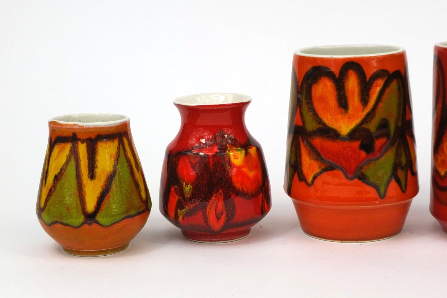 Six Poole Pottery Delphis Vases Including A Pair By Cynthia Bennett 