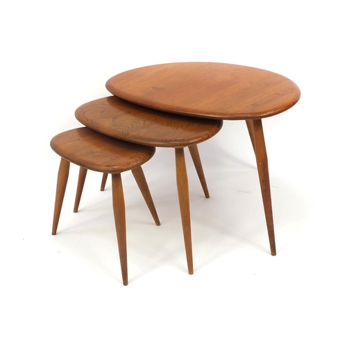 2042 - Ercol nest of three pebble tables, the largest 40cm high x 60cm wide x 44cm deep