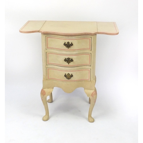 2026 - Cream and pink painted three drawer serpentine fronted chest with drop sides, 73cm high