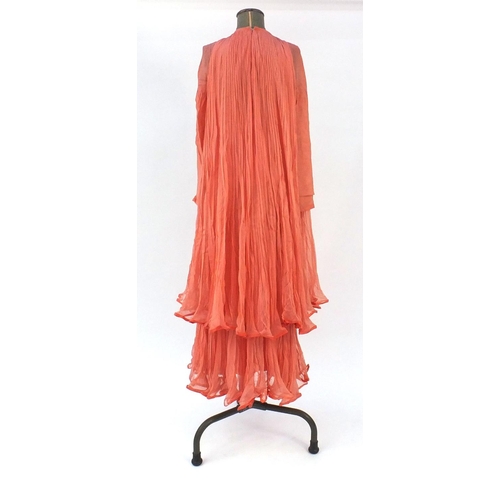 25 - Two vintage dresses including a Grecian design example, one with Pauka London W1 Label to the interi... 