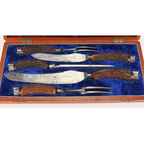 47 - James Deakin & Sons horn handle five piece carving set with silver finials, the largest piece 38cm l... 