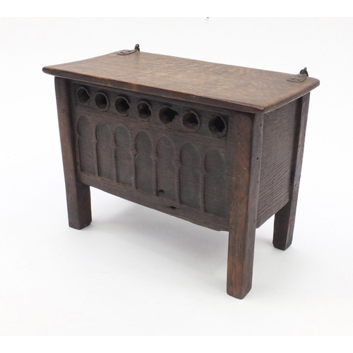 41 - Antique oak plank coffer of small proportions with hinged lid, the front panel with gothic arches, 3... 