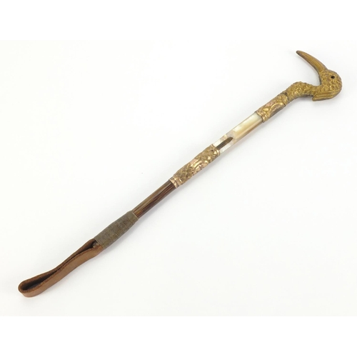 30 - Gilt metal Mother of Pearl and bamboo riding crop, the handle in the form of a bird, 39cm in length