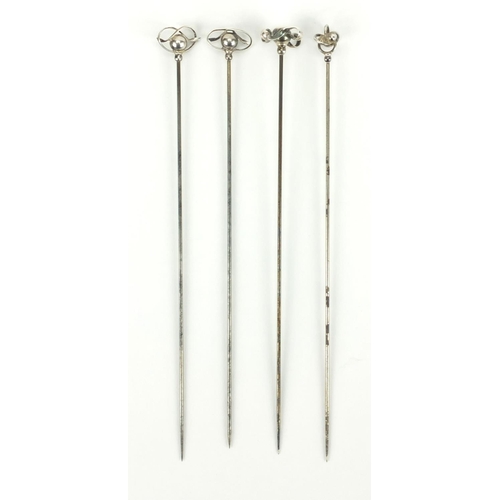 9 - Four Art Nouveau silver hat pins by Charles Horner, all stamped sterling, the largest 17cm in length