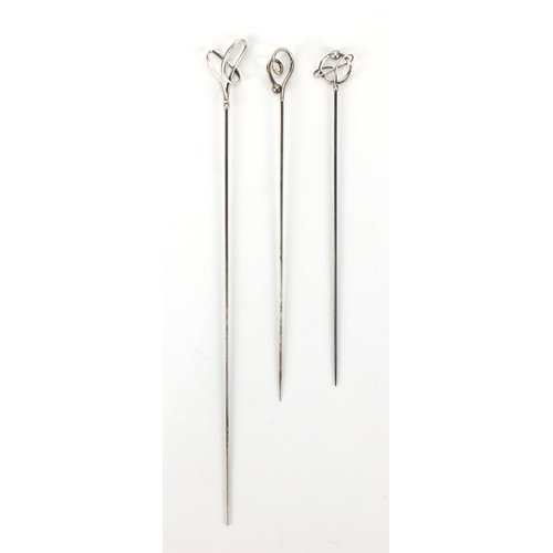 7 - Three Art Nouveau silver hat pins by Charles Horner, various hallmarks, the largest 24.5cm in length