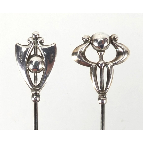 8 - Two Art Nouveau silver hat pins by Charles Horner, one with Chester hallmarks the other stamped ster... 