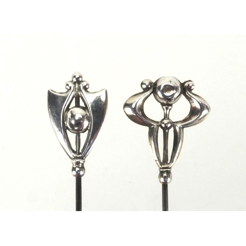 8 - Two Art Nouveau silver hat pins by Charles Horner, one with Chester hallmarks the other stamped ster... 