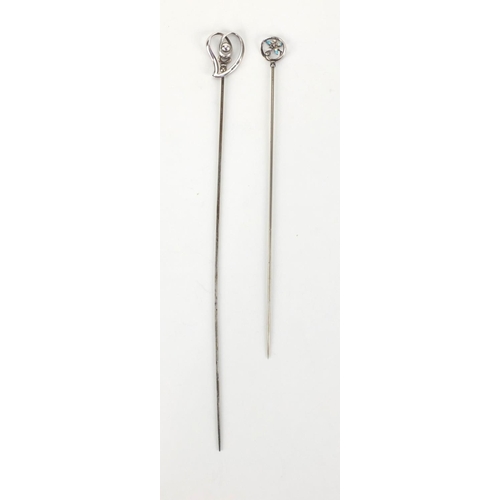 6 - Two Art Nouveau silver hat pins by Charles Horner, comprising a free moving love heart example and a... 