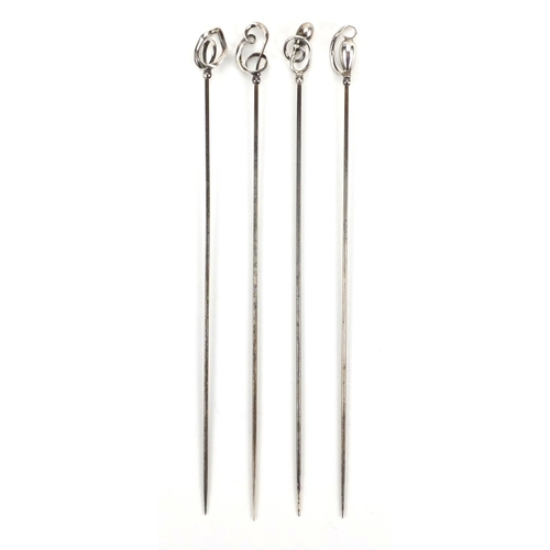 10 - Four Art Nouveau silver hat pins by Charles Horner, various hallmarks, the largest 16.5cm in length