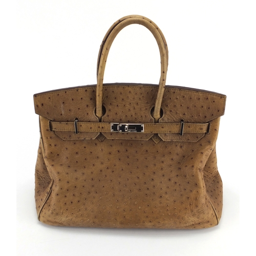 19 - Hermes of Pairs, France Ostrich leather Birkin, 25cm high x 38cm wide excluding the handles.

We hav... 