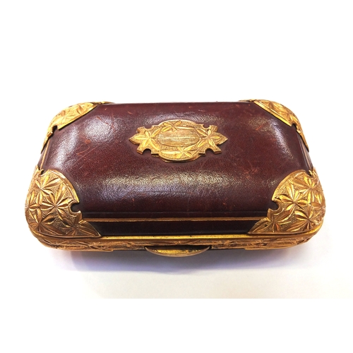 28a - Edwardian leather purse with gilt decoration, 9cm wide