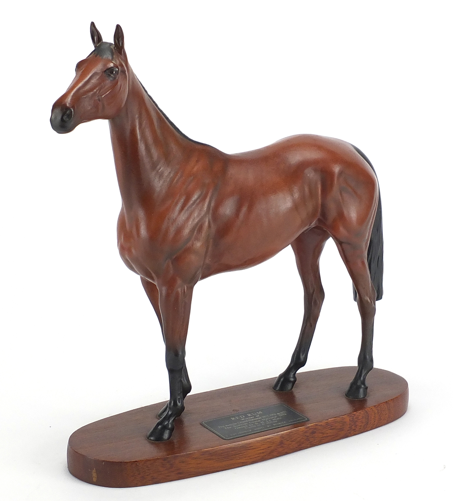 Beswick figure of Red Rum on wooden plinth, 30cm high