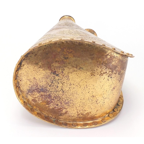 586 - Islamic gilded copper water flask, engraved with stylised foliate motifs, 27cm high