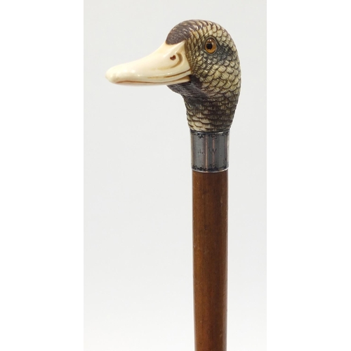 25 - 19th century parasol with carved ivory ducks head handle by Brigg & Sons, the ducks head having inse... 