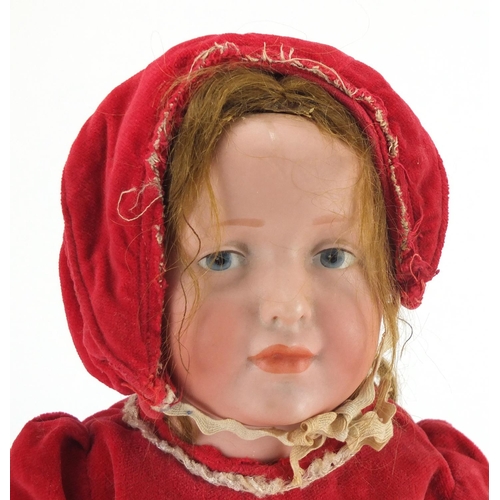 495 - 19th century German bisque headed doll, with jointed limbs in traditional dress, impressed KR 109 to... 