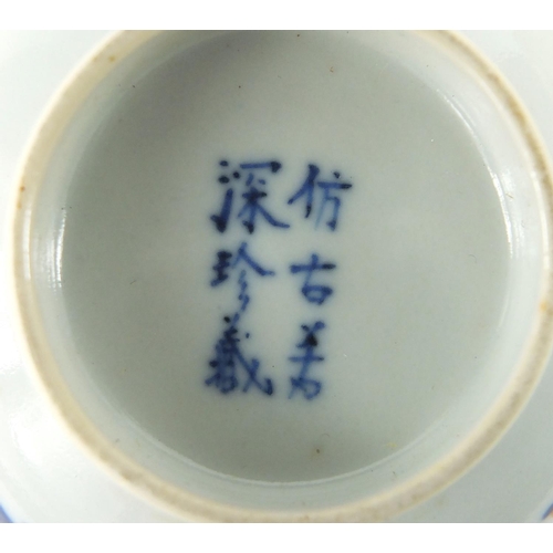 629 - Chinese blue and white porcelain tea bowl, hand painted with flower heads amongst foliate scrolls an... 