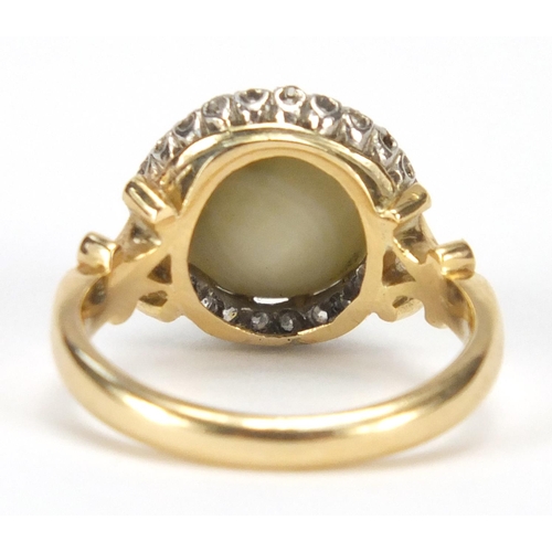 656 - 18ct gold green cabochon tiger's eye and diamond ring with scroll shoulders, the band stamped R.P po... 