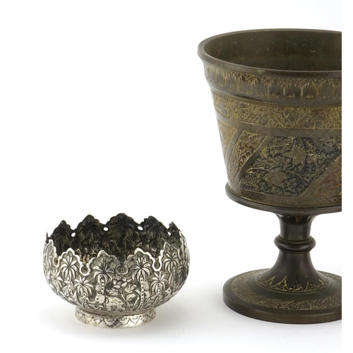 401 - Two Anglo Indian unmarked silver bowls together with an enamelled brass chalice, the largest 16cm hi... 