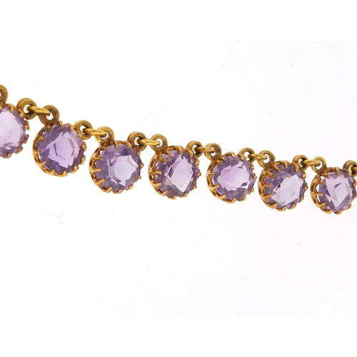 707 - Antique unmarked gold graduated amethyst necklace, 42cm in length, approximate weight 24.5g