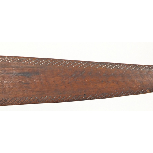 371 - Andaman Islands wood bow of double paddle form, with incised decoration, 197cm in length