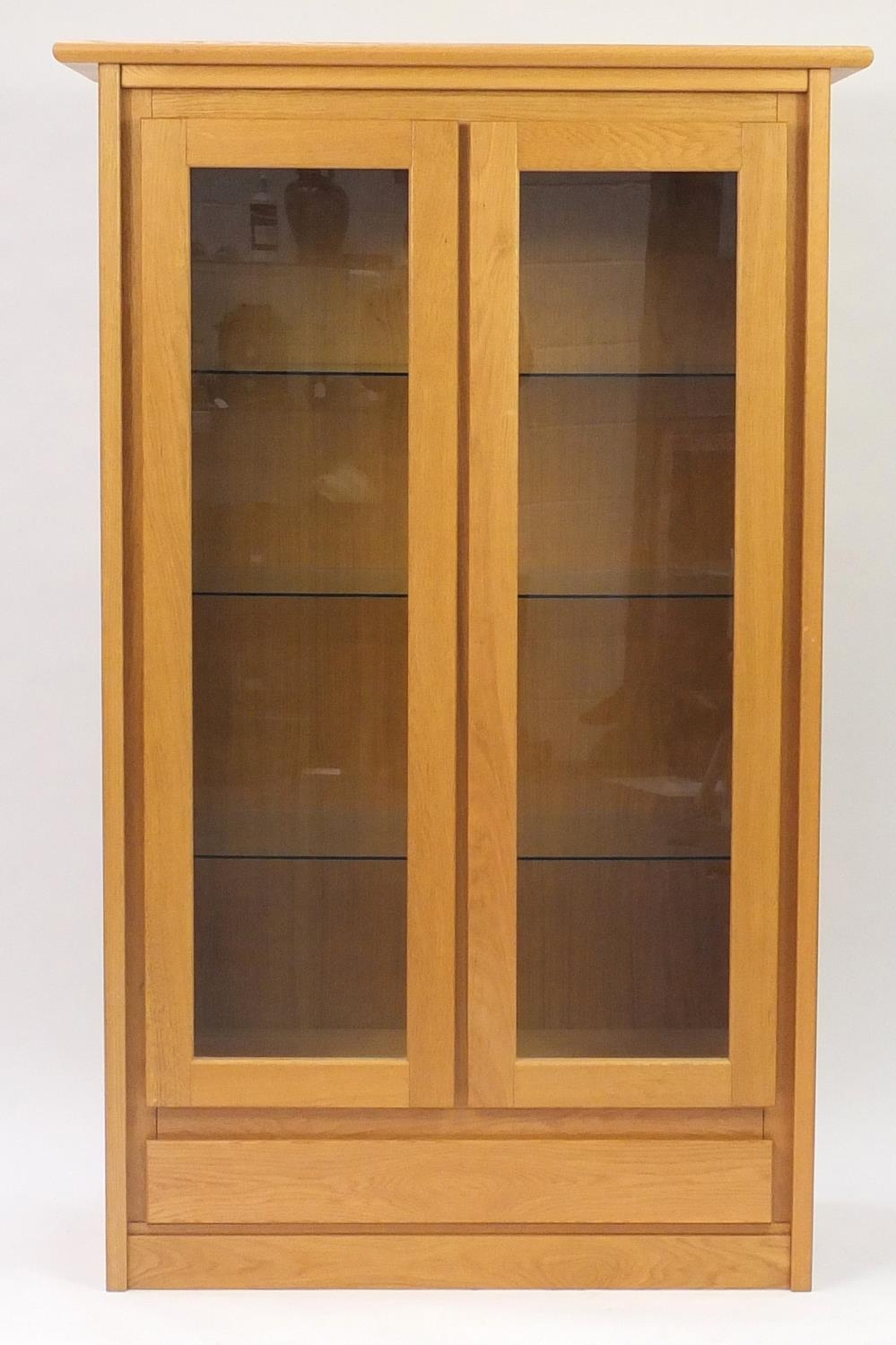 Contemporary Light Oak Display Cabinet Fitted With Three Glass