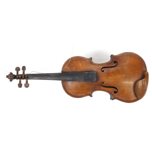 168 - Old wooden violin with wooden travelling case, the violin bearing a Pietro Antonius label to the int... 