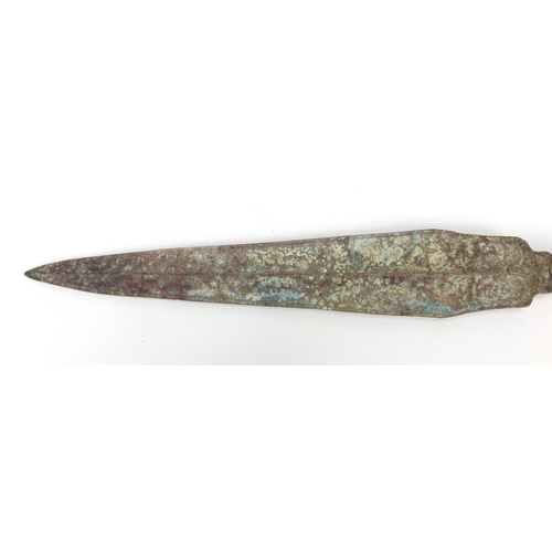 285 - Islamic patinated bronze short sword, 36cm in length