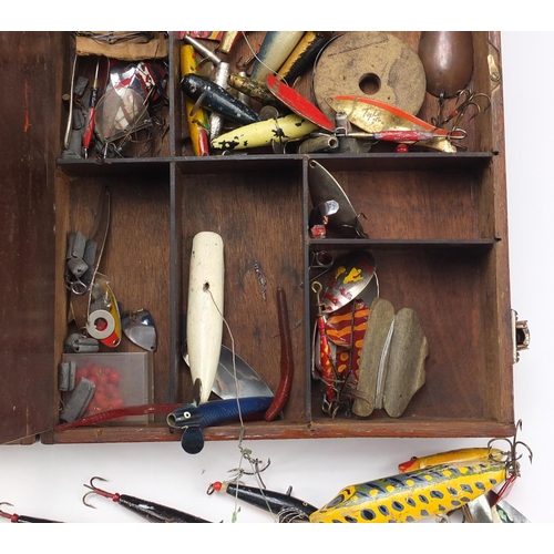 140 - Collection of vintage fishing lures including some hand painted, possibly some by Hardy, housed in a... 