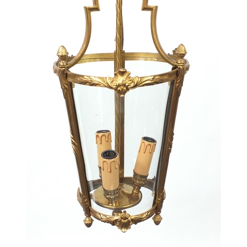 29 - French style brass and glass hanging lantern with acorn finials, 55cm high excluding the chain